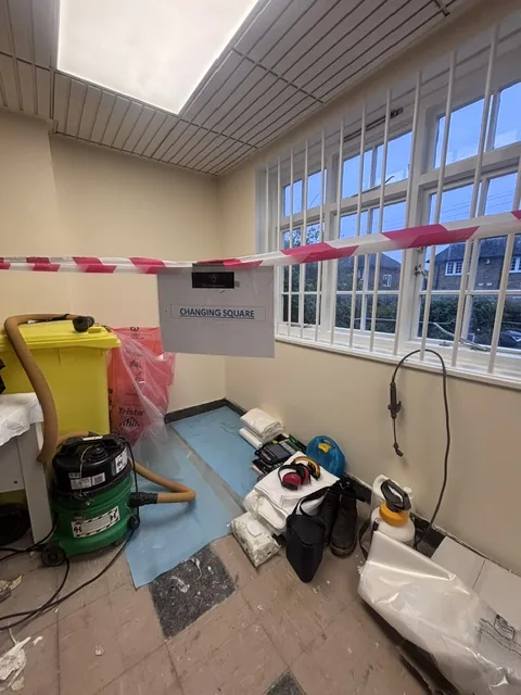 Asbestos floor tile and bitumen removal in Muswell Hill